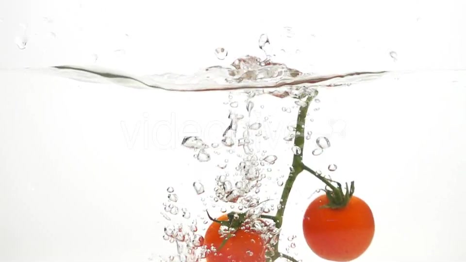 Whole Tomatoes Falling Through Water. - Download Videohive 19450525