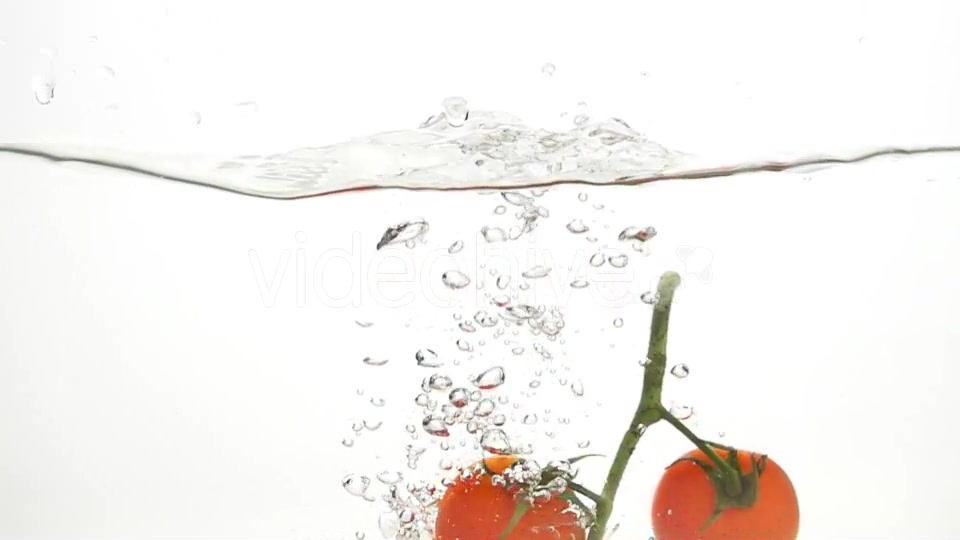 Whole Tomatoes Falling Through Water. - Download Videohive 19450525