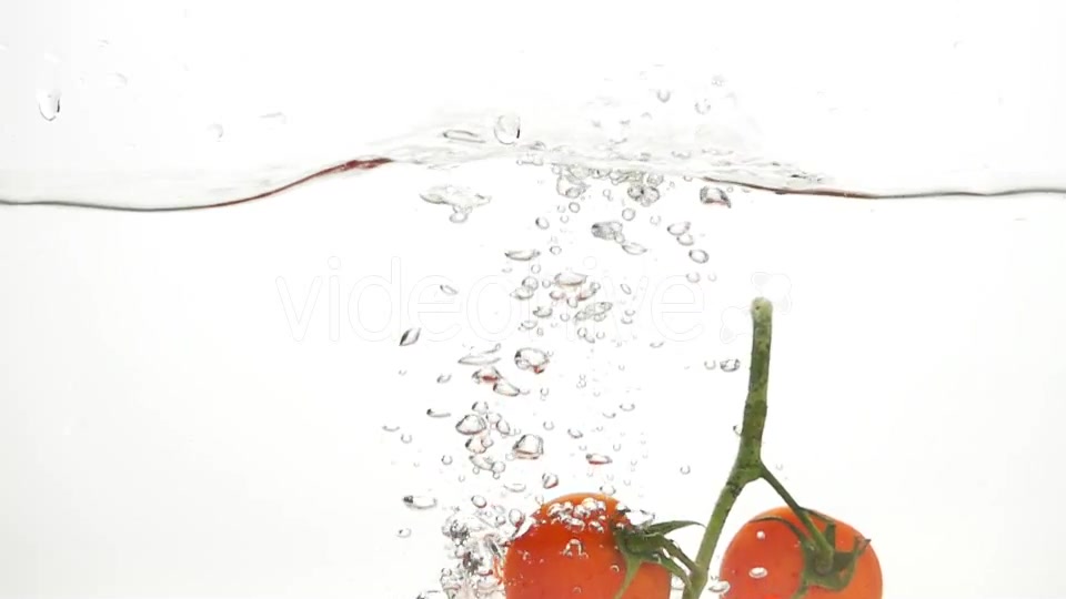 Whole Tomatoes Falling Through Water. - Download Videohive 19450525