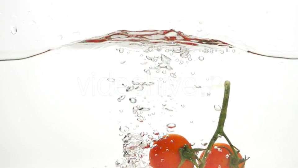 Whole Tomatoes Falling Through Water. - Download Videohive 19450525