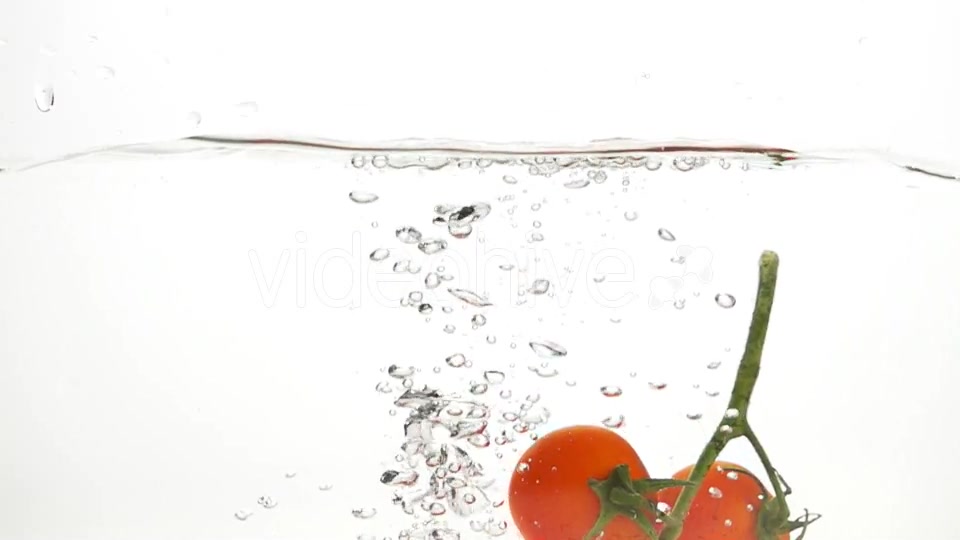 Whole Tomatoes Falling Through Water. - Download Videohive 19450525