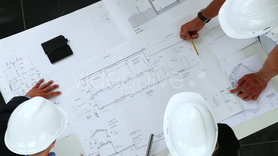 Young Architects Working On New Construction With Blueprints  Videohive 8841017 Stock Footage Image 11