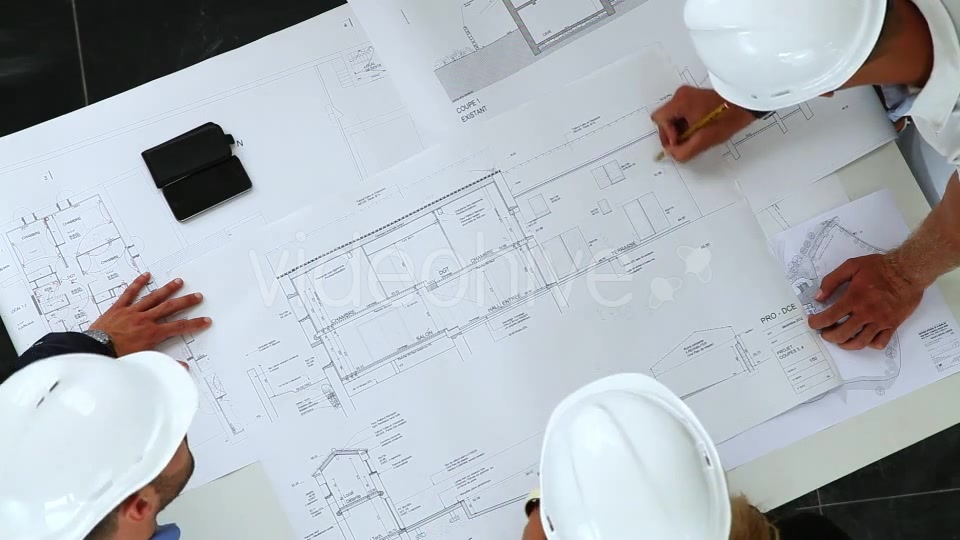 Young Architects Working On New Construction With Blueprints  Videohive 8841017 Stock Footage Image 5