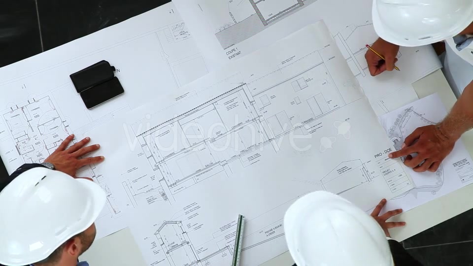 Young Architects Working On New Construction With Blueprints  Videohive 8841017 Stock Footage Image 6