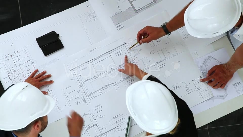 Young Architects Working On New Construction With Blueprints  Videohive 8841017 Stock Footage Image 7