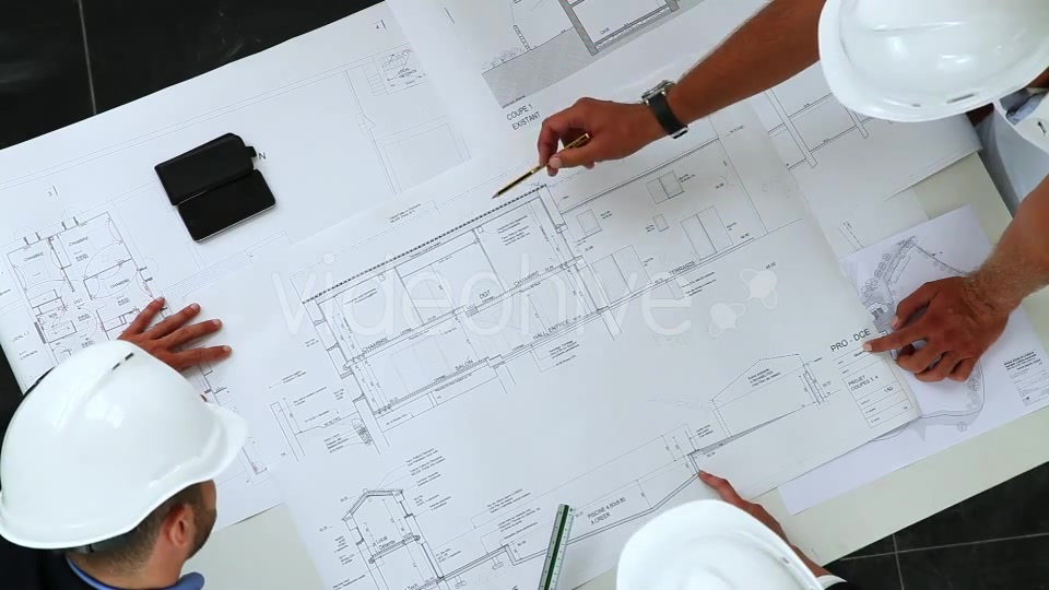 Young Architects Working On New Construction With Blueprints  Videohive 8841017 Stock Footage Image 9