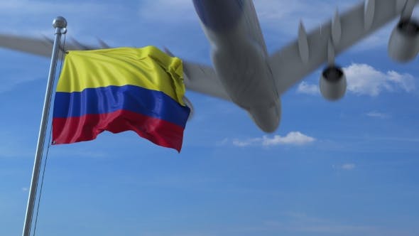 Airplane Flying Over Waving Flag of Colombia - Videohive Download 21080376