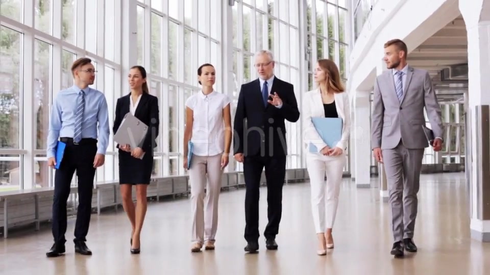 Business People Walking Along Office Building 7  Videohive 17383517 Stock Footage Image 4