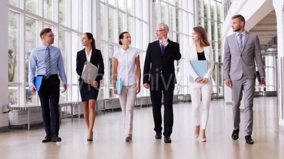 Business People Walking Along Office Building 7  Videohive 17383517 Stock Footage Image 5