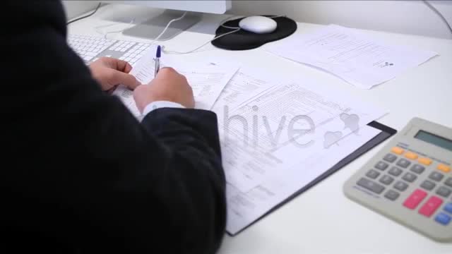 Businessman Filling Tax Forms  Videohive 3334203 Stock Footage Image 1
