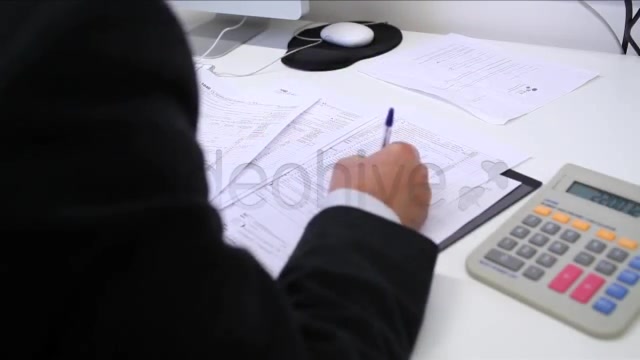 Businessman Filling Tax Forms  Videohive 3334203 Stock Footage Image 12