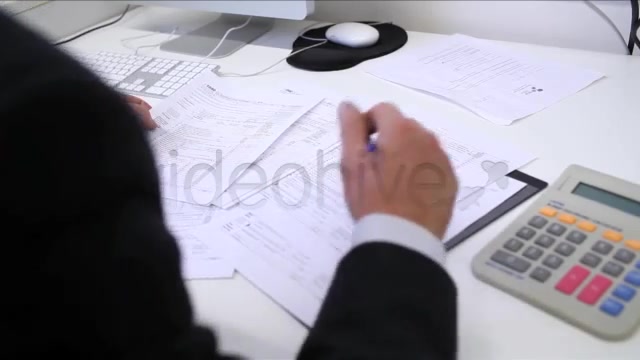 Businessman Filling Tax Forms  Videohive 3334203 Stock Footage Image 5