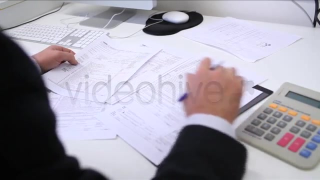Businessman Filling Tax Forms  Videohive 3334203 Stock Footage Image 6