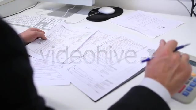 Businessman Filling Tax Forms  Videohive 3334203 Stock Footage Image 8