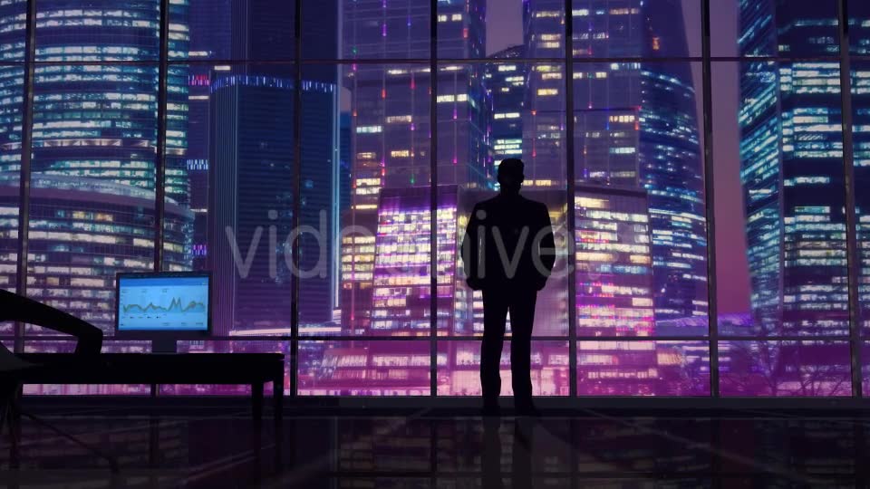 Businessman In An Office On A Background Of Night Skyscrapers Videohive 20445687 Motion Graphics Image 2