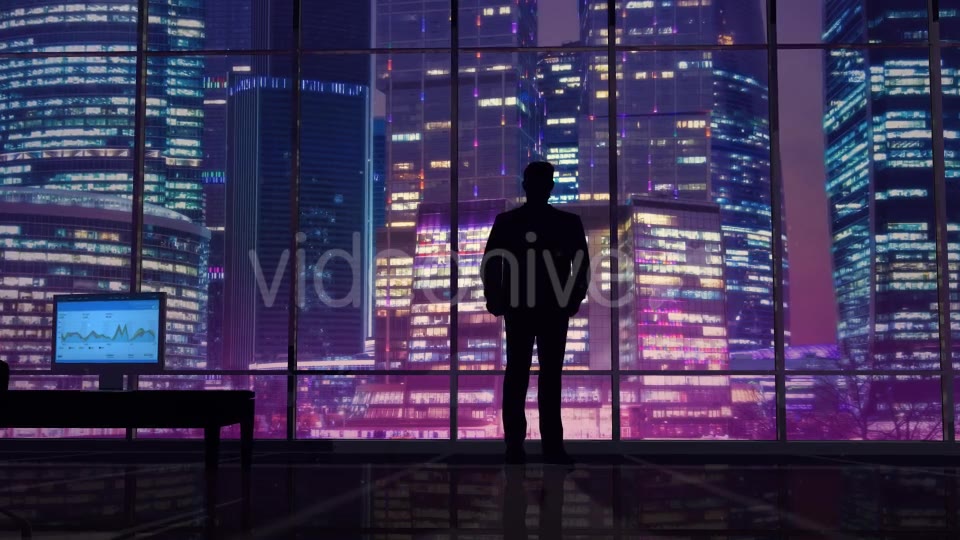 Businessman In An Office On A Background Of Night Skyscrapers Videohive 20445687 Motion Graphics Image 3