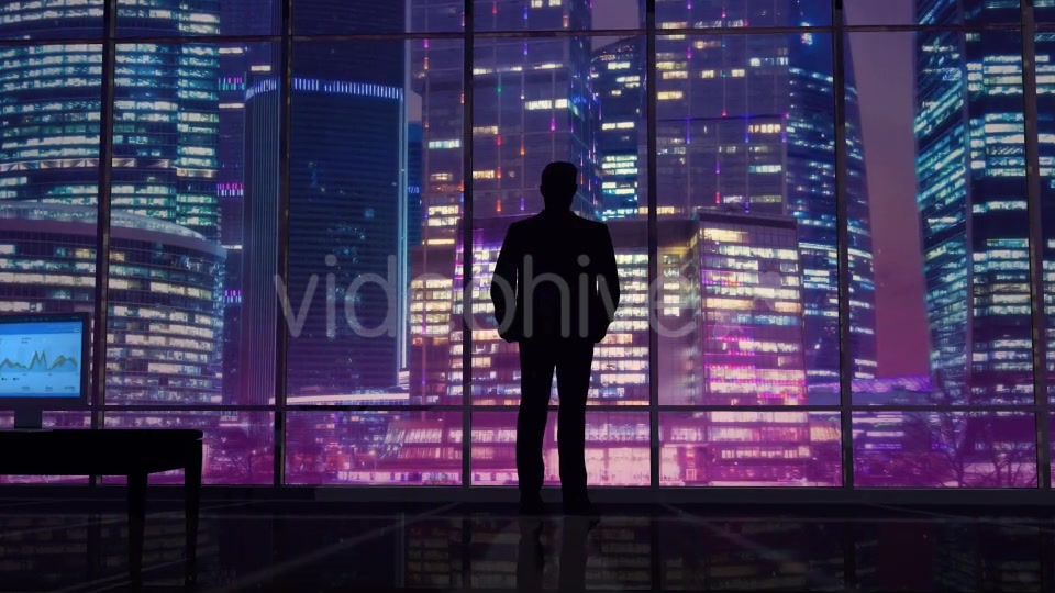Businessman In An Office On A Background Of Night Skyscrapers Videohive 20445687 Motion Graphics Image 4