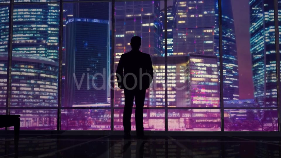 Businessman In An Office On A Background Of Night Skyscrapers Videohive 20445687 Motion Graphics Image 6