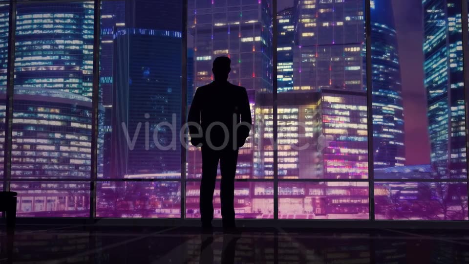 Businessman In An Office On A Background Of Night Skyscrapers Videohive 20445687 Motion Graphics Image 7