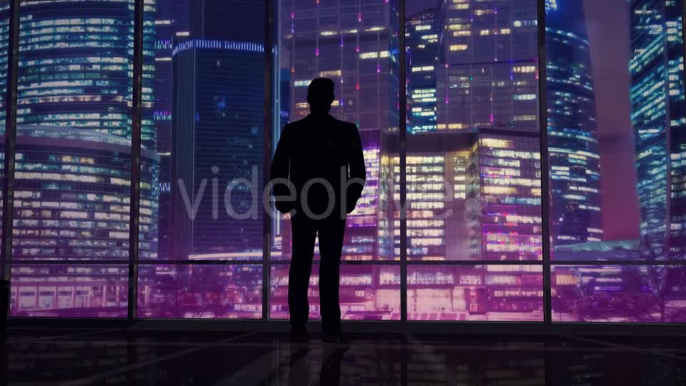 Businessman In An Office On A Background Of Night Skyscrapers Videohive 20445687 Motion Graphics Image 8