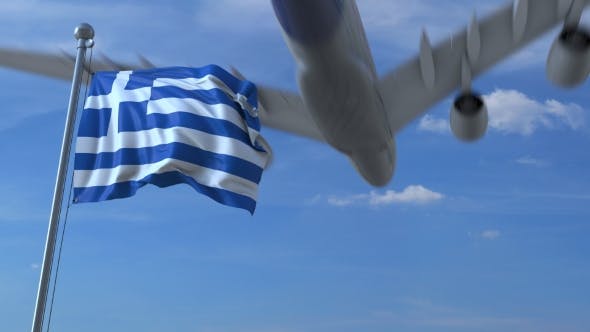 Commercial Airplane Landing Behind Waving Greek Flag - 20536718 Download Videohive