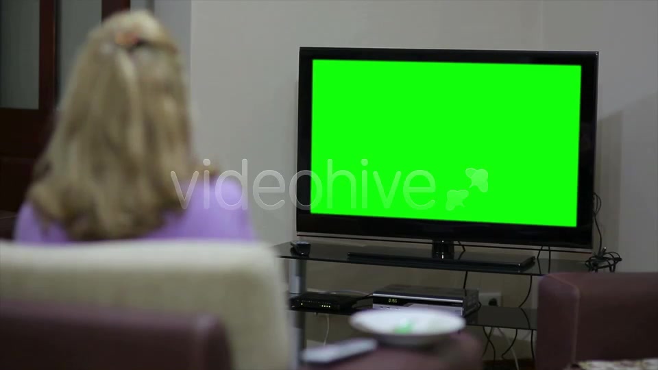Couple Sitting In Front Of Blank Green TV Screen  Videohive 7794120 Stock Footage Image 5