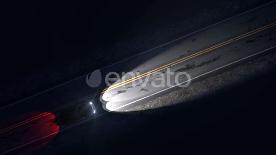 Drone View of Car Driving on a Night Country Road with Headlights On Videohive 24994209 Motion Graphics Image 1