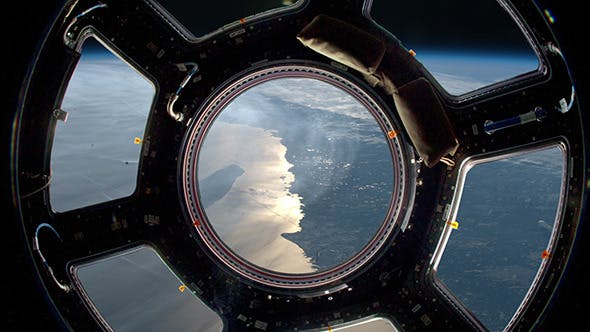Earth As Seen Through Window Of Space Station - Videohive Download 10476156