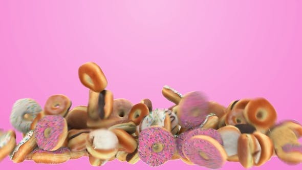 Falling Different Donuts on a Pink Background - Videohive Download 22279885