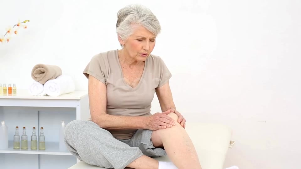 Injured Patient Rubbing Her Painful Knee  Videohive 8322587 Stock Footage Image 3