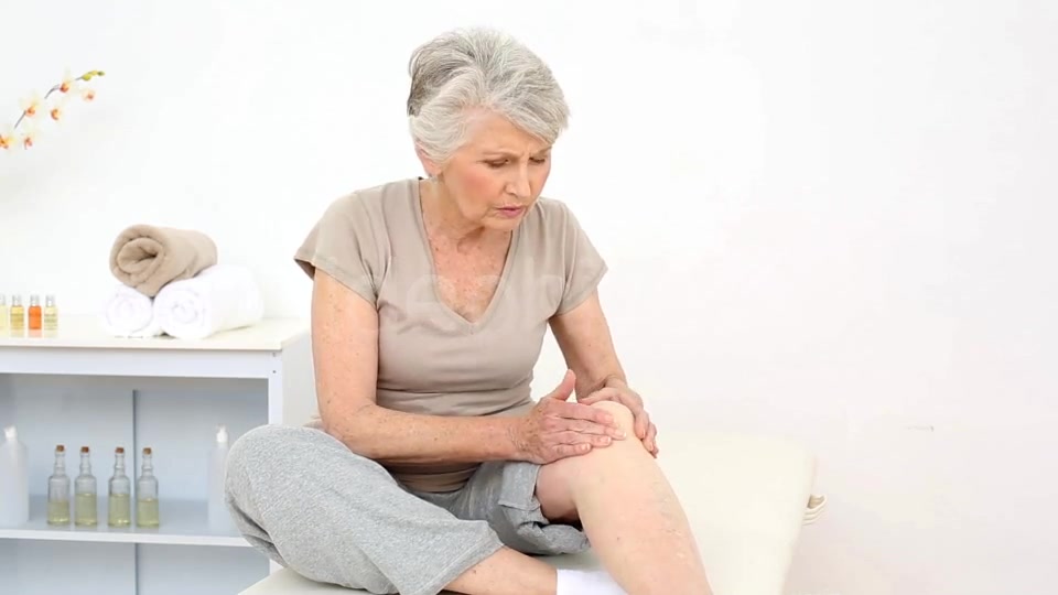 Injured Patient Rubbing Her Painful Knee  Videohive 8322587 Stock Footage Image 4