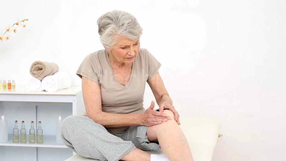 Injured Patient Rubbing Her Painful Knee  Videohive 8322587 Stock Footage Image 5