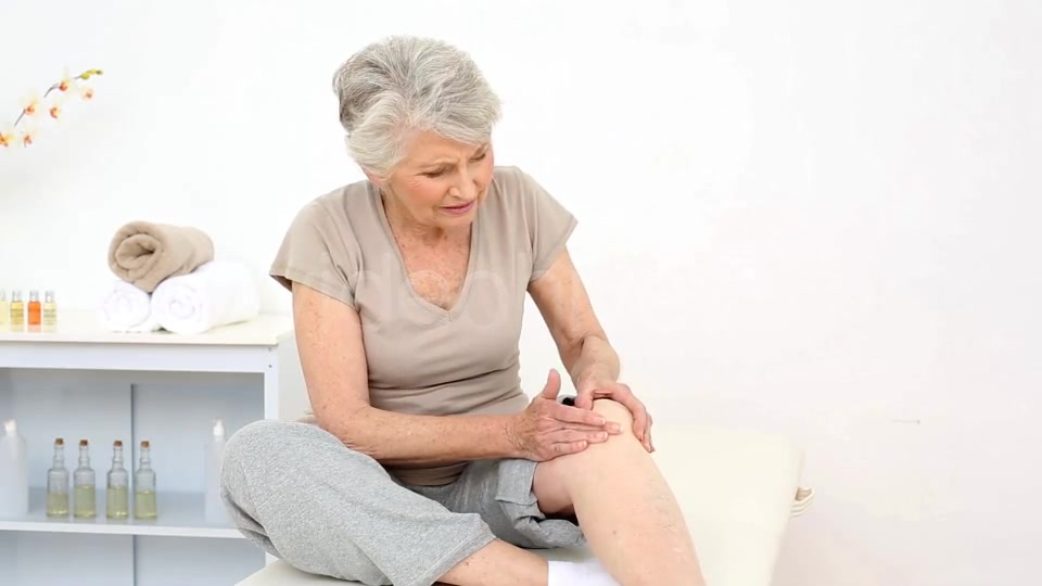 Injured Patient Rubbing Her Painful Knee  Videohive 8322587 Stock Footage Image 6