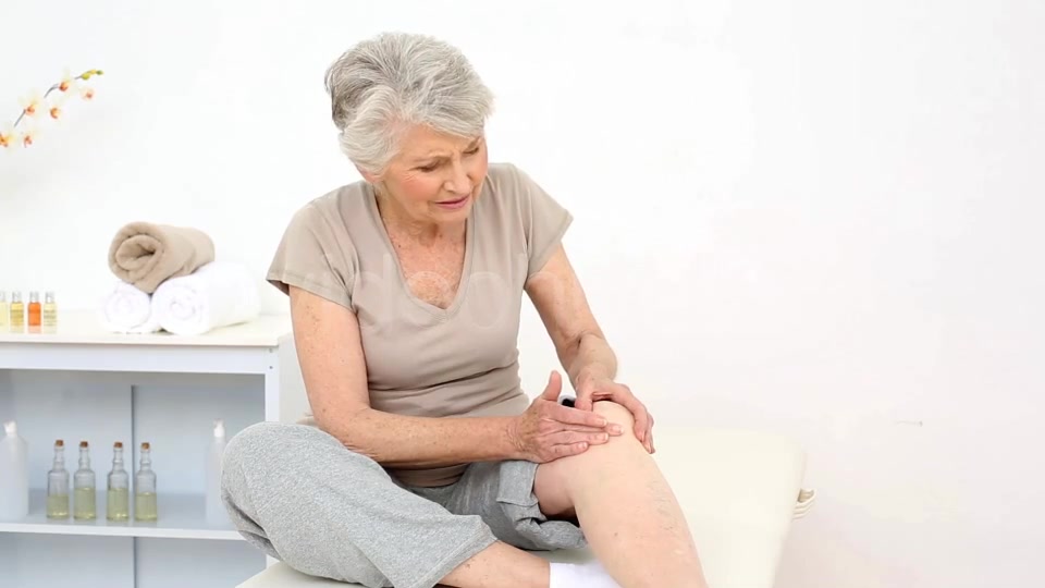 Injured Patient Rubbing Her Painful Knee  Videohive 8322587 Stock Footage Image 7