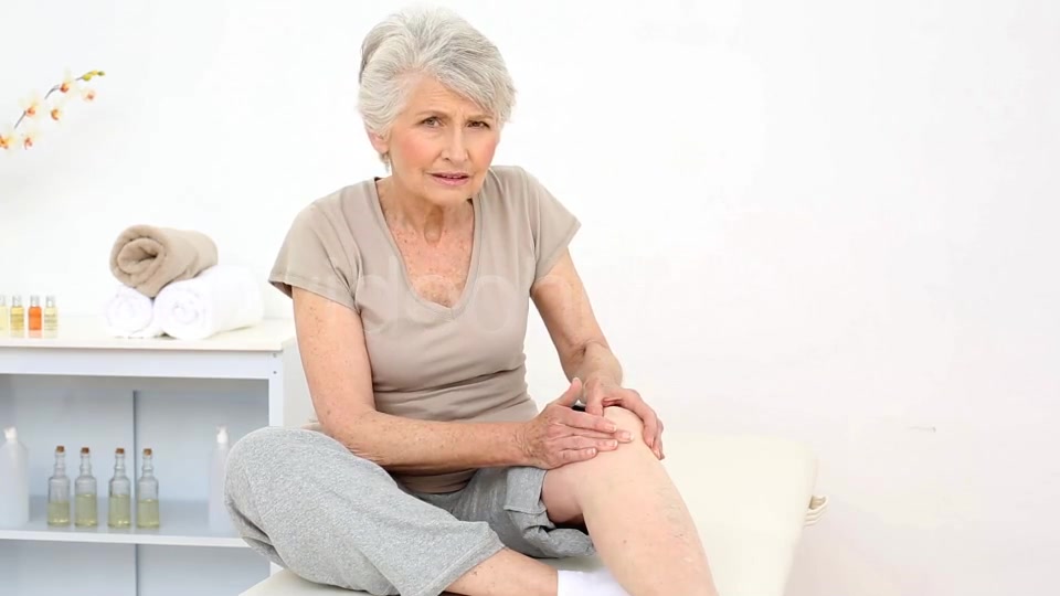 Injured Patient Rubbing Her Painful Knee  Videohive 8322587 Stock Footage Image 8