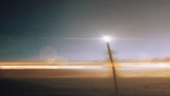 Space Rocket Launching into Space Through the Clouds at Sunset - Download Videohive 24590293