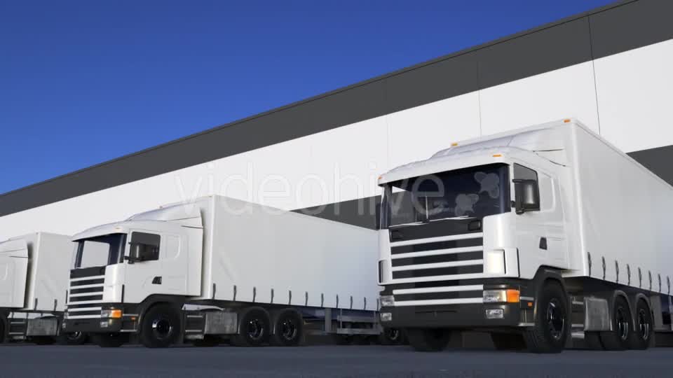 White Freight Semi Trucks Loading or Unloading Videohive 20430020 Motion Graphics Image 1