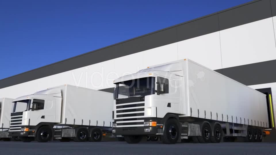 White Freight Semi Trucks Loading or Unloading Videohive 20430020 Motion Graphics Image 2