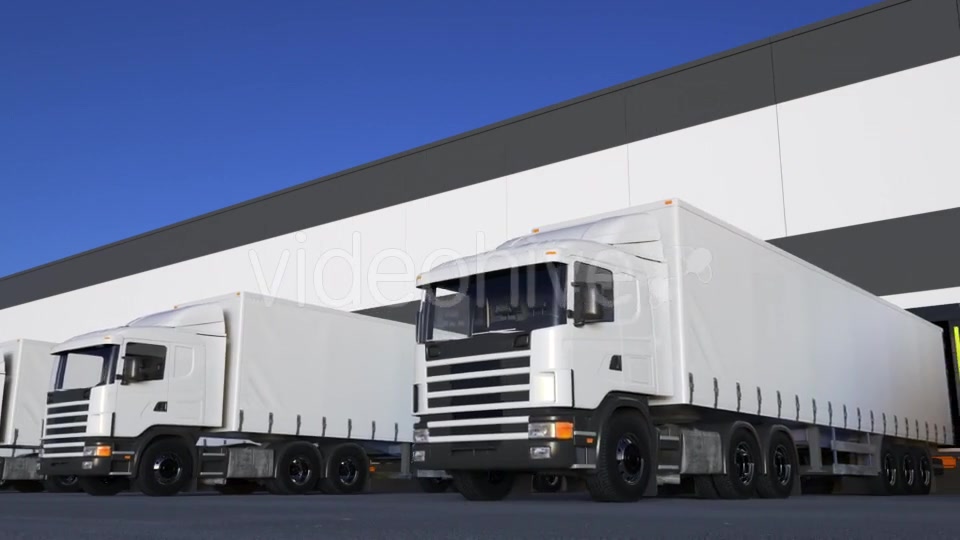 White Freight Semi Trucks Loading or Unloading Videohive 20430020 Motion Graphics Image 6
