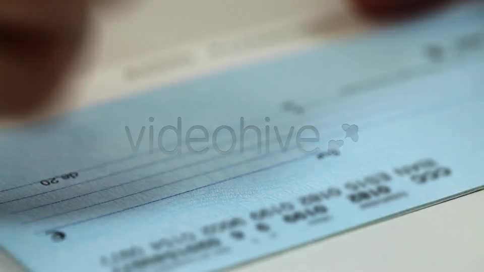 Writing A Check  Videohive 7874955 Stock Footage Image 1