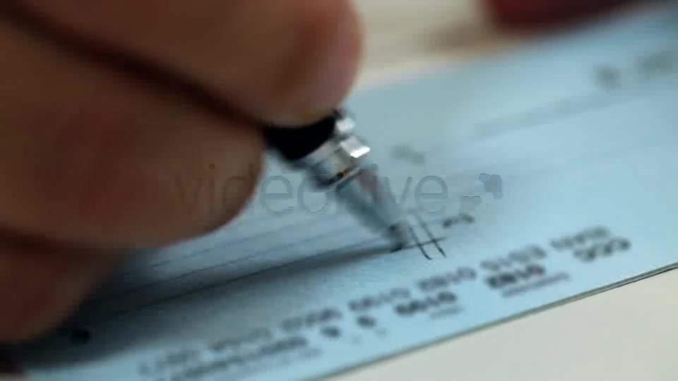 Writing A Check  Videohive 7874955 Stock Footage Image 2